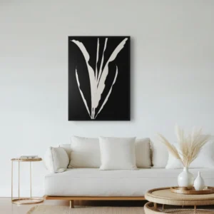 ClassicPlainz Wheat Sprout black and white abstract wall art decor hanging on a plain white wall above a sofa in a living room